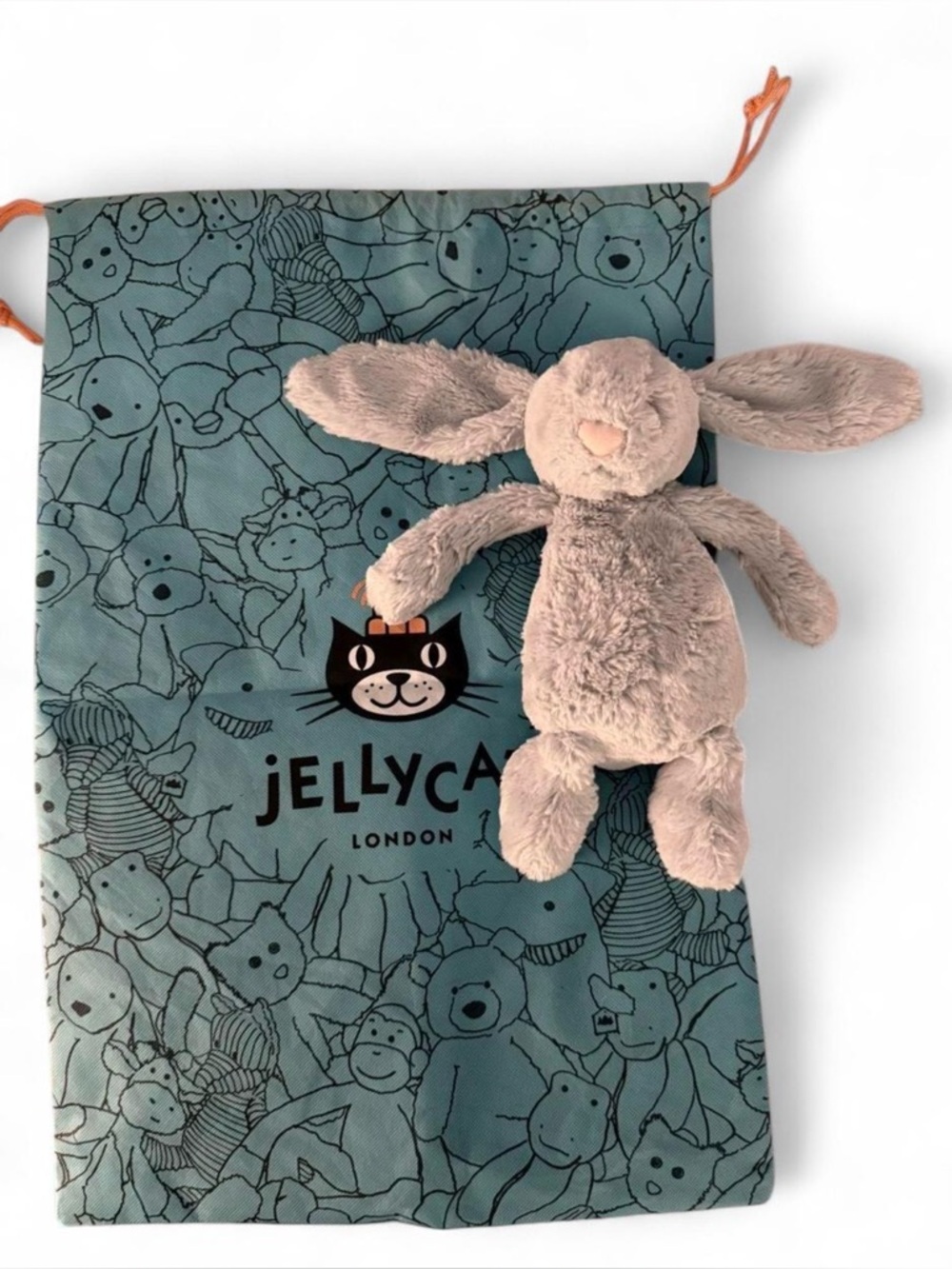 JELLYCAT light blue bashful bunny 12” with large logo dust cover.Great condition